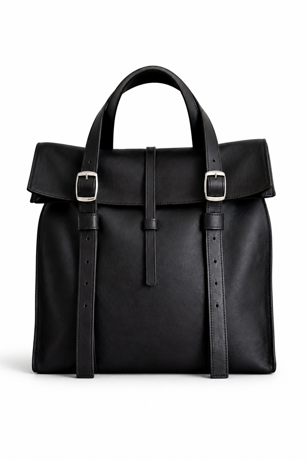 Black leather satchel by Ella Jackson Australia with adjustable buckled straps and flap closure, handcrafted and displayed in STUDIO Ella Jackson, Hobart.