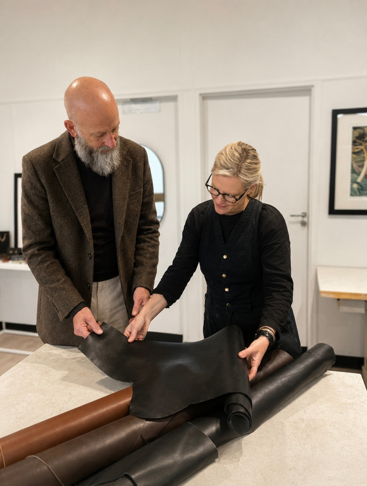 Customer selecting leather with Ella Jackson during a custom bag consultation at STUDIO Ella Jackson, Hobart.