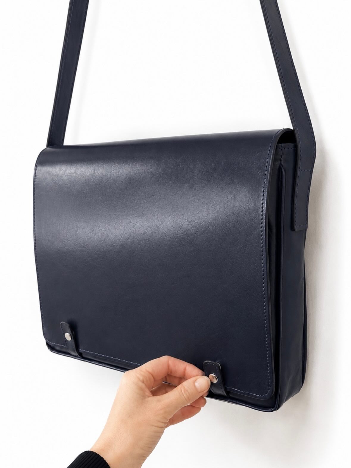 Navy blue kangaroo leather messenger bag by Ella Jackson Australia with magnetic flap closure, handcrafted at STUDIO Ella Jackson in Hobart.