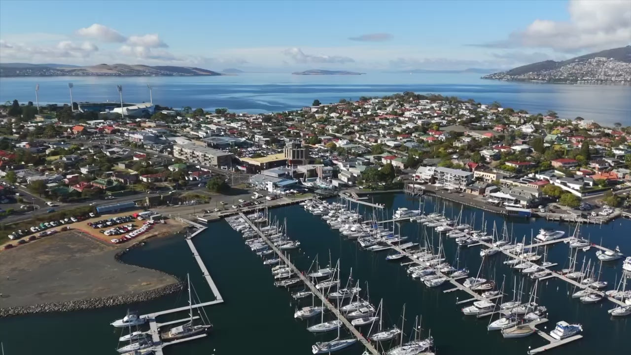 Load video: Inside STUDIO Ella Jackson, a Tasmanian leather studio and gallery space, showing handmade leather bags, workbench, sewing equipment, and the making environment